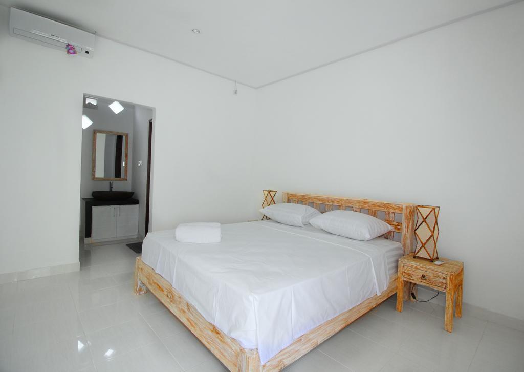 Andy Guesthouse Canggu Esterno foto