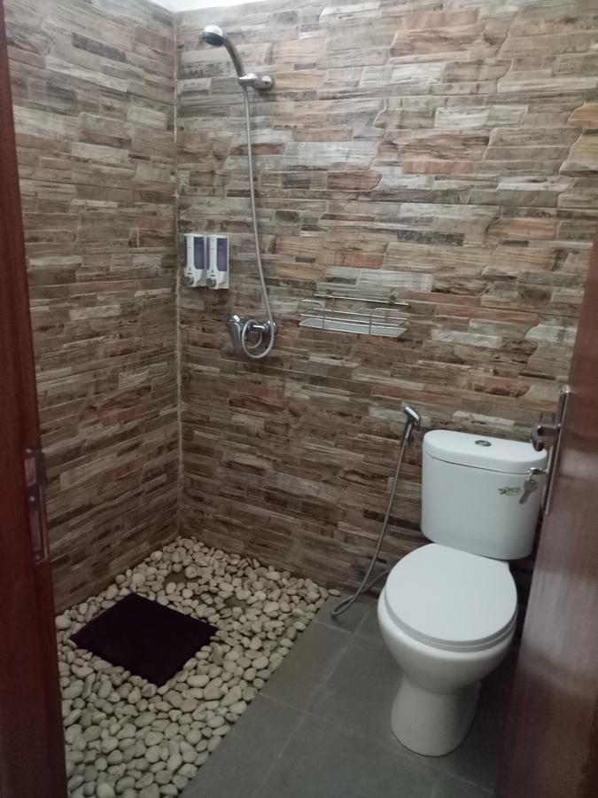 Andy Guesthouse Canggu Esterno foto