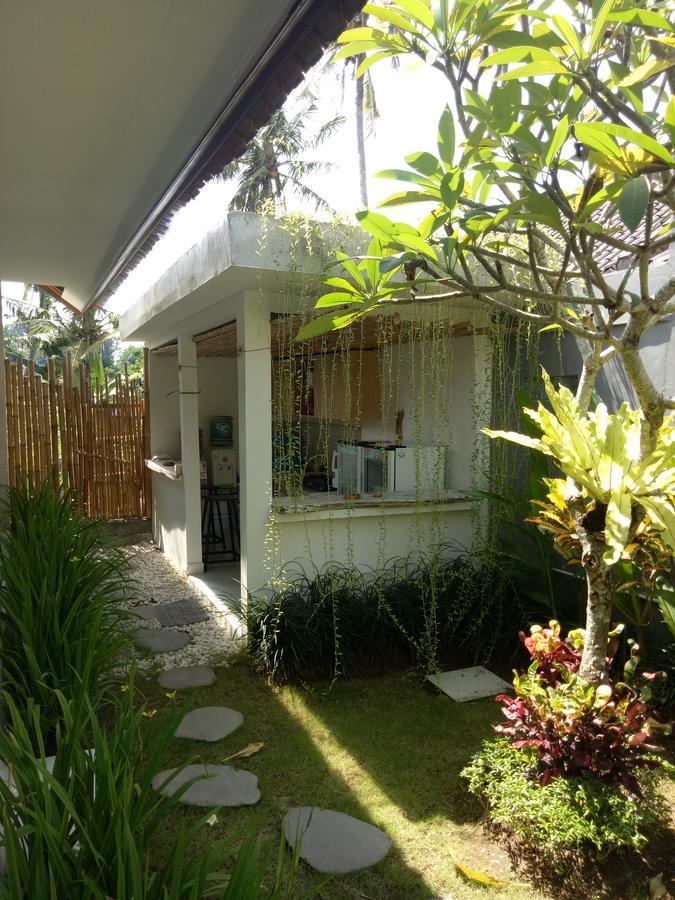 Andy Guesthouse Canggu Esterno foto