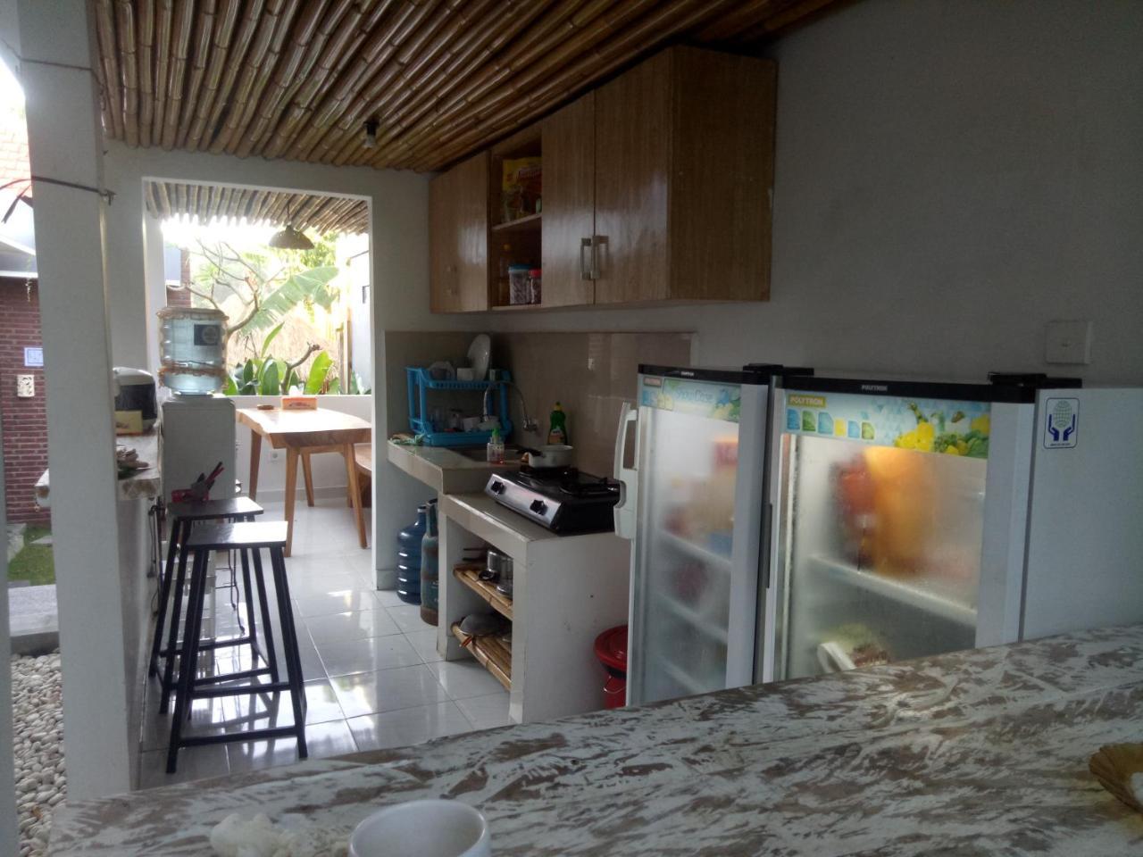 Andy Guesthouse Canggu Esterno foto